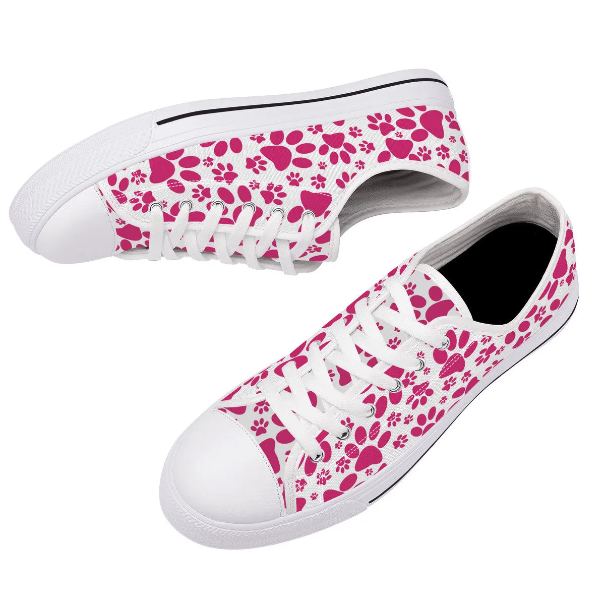 Vibrant Tracks: Hot Pink Animal Paw Prints Canvas Sneakers
