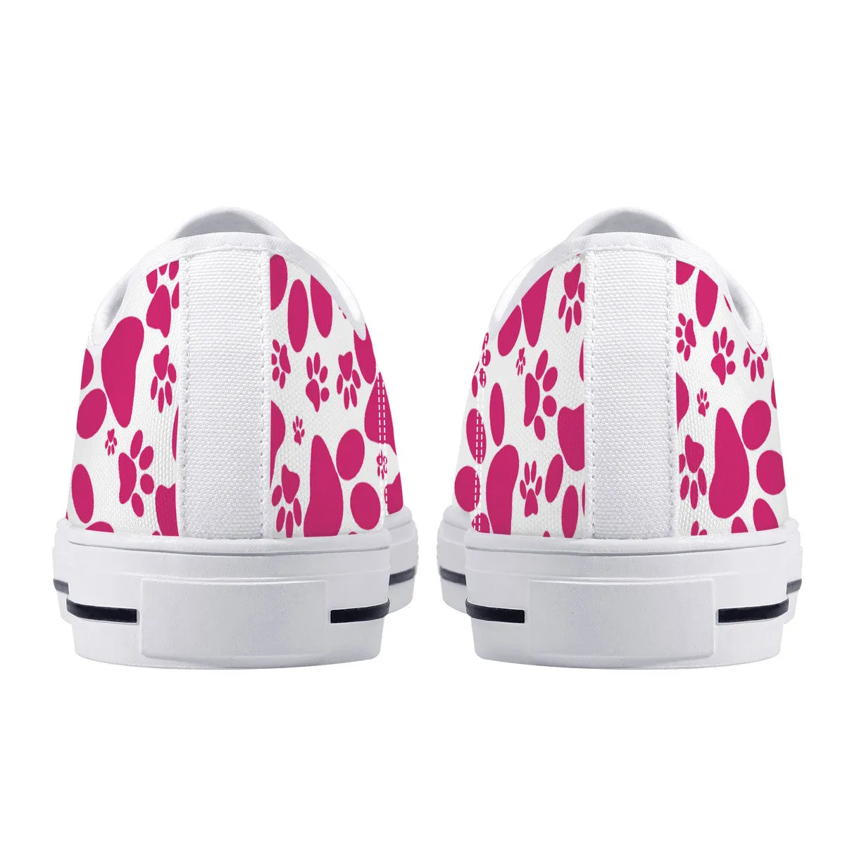 Vibrant Tracks: Hot Pink Animal Paw Prints Canvas Sneakers