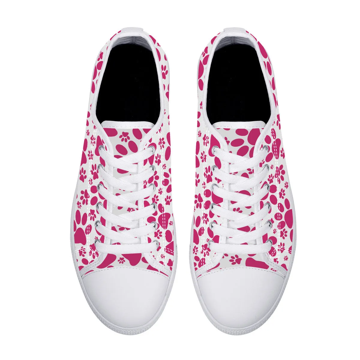 Vibrant Tracks: Hot Pink Animal Paw Prints Canvas Sneakers