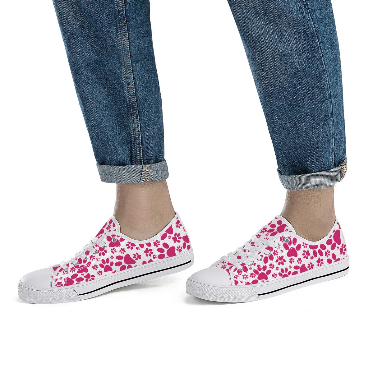 Vibrant Tracks: Hot Pink Animal Paw Prints Canvas Sneakers
